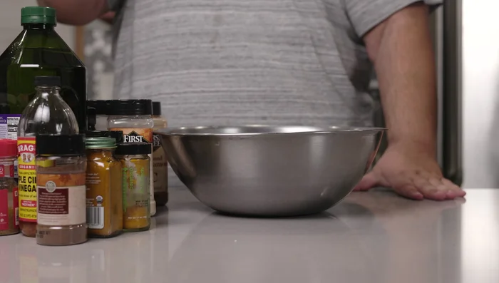 Prepare the marinade according to the recipe (detailed ingredients list available in the video).