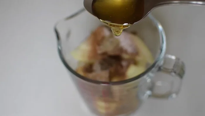 Add vinegar and honey to the jug.