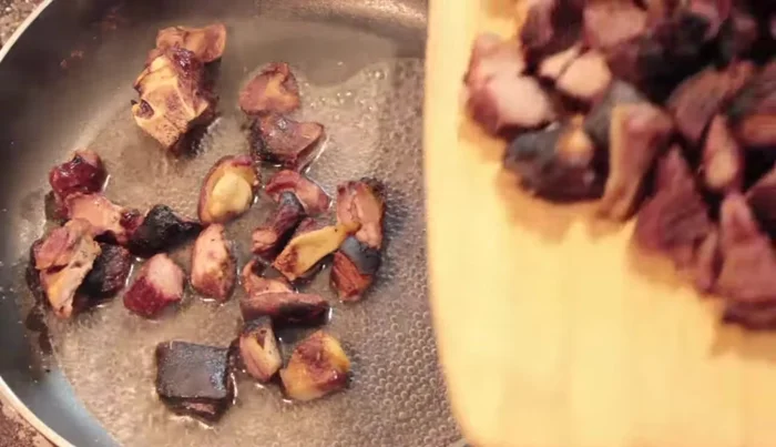Add the goat meat chunks to a pan with a little water and steam on low heat for 3-5 minutes to make it softer.