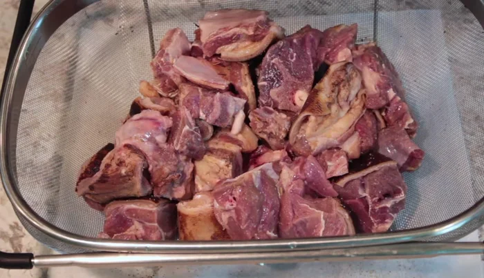 Season the goat meat with Maggi and salt. Mix well.