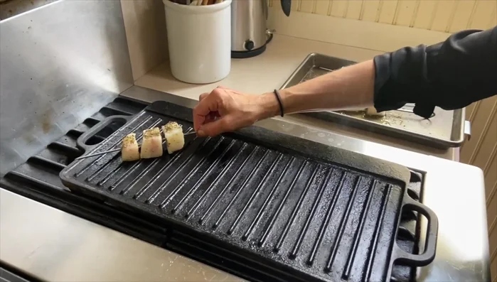 Grill the kebabs in a preheated grill pan until golden brown on both sides (about 2 minutes per side).
