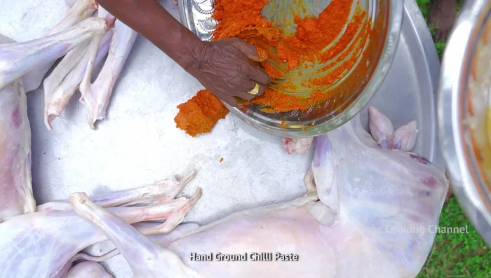 Prepare the mutton: Wash and clean the goat meat thoroughly. Apply turmeric, chili, ginger, garlic, crushed pepper, and crushed rock salt to the meat. Rub it all over, ensuring it is well coated.