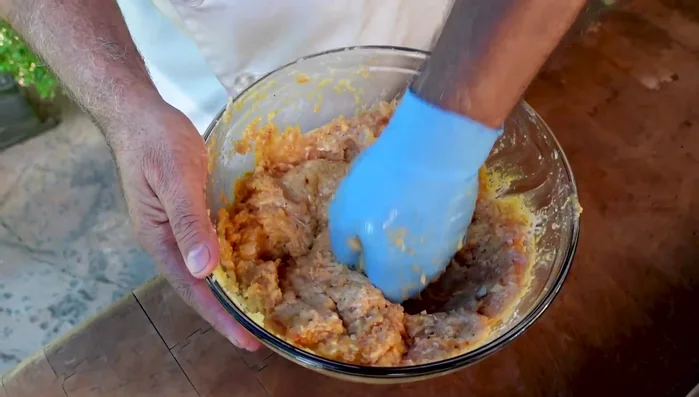 Mix thoroughly until the mixture becomes sticky and clings to your hands (about 20 minutes).