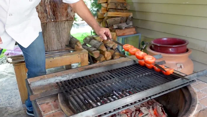 Optional: Add tomato and Anaheim pepper skewers to the grill.