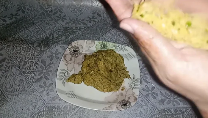 Grease your hands with oil and shape the mixture into small kabab shapes.