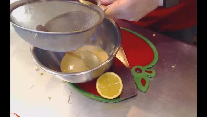 Add lemon juice, mixing thoroughly. Gradually add water to reach desired sauce consistency. (195.34)