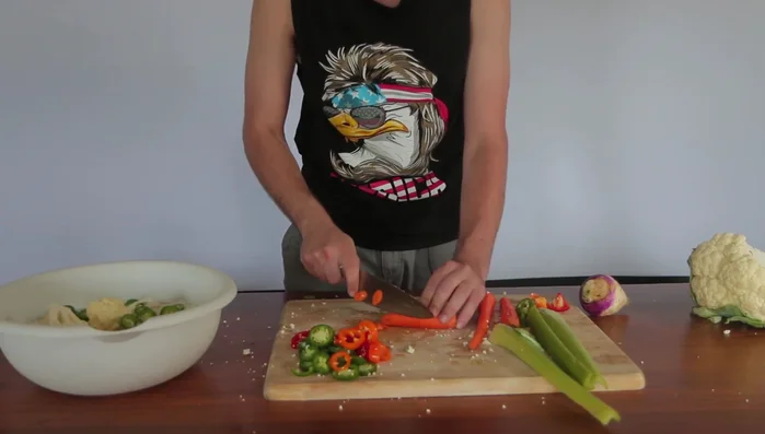 Cut carrots into angled slices.