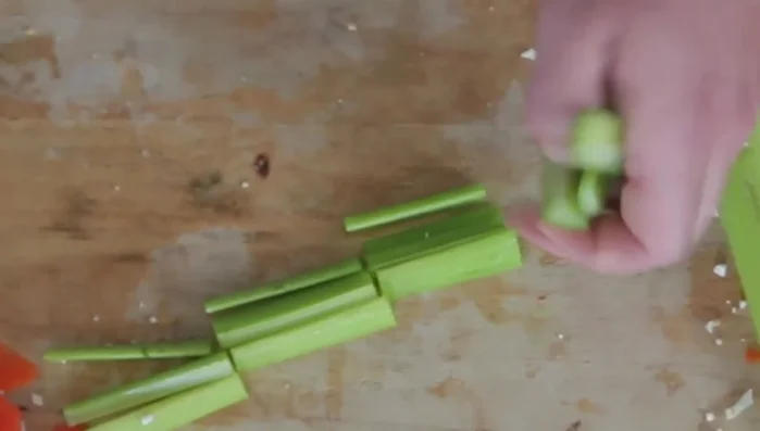 Cut celery into sticks.