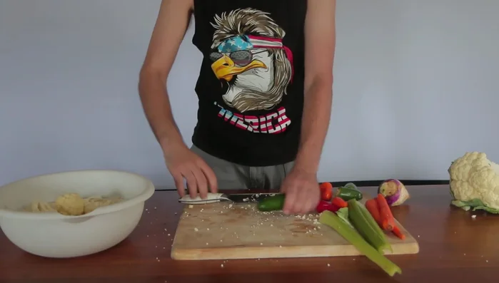 Slice jalapeno peppers into rings (adjust amount based on desired spiciness).