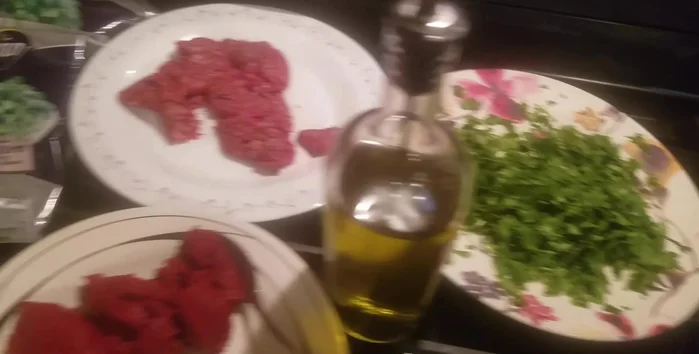 Add ground beef, minced garlic, and cilantro to the okra.