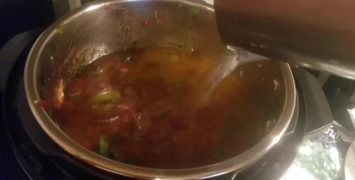 Add water to the Instant Pot up to the maximum line.