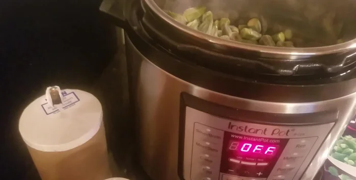 Sauté the frozen okra in olive oil. This will take some time.