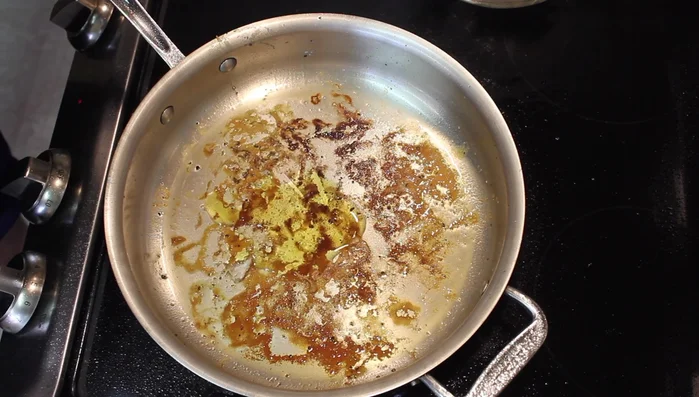 Add a little more olive oil to the pan, then add the sliced onion and cook for about 3-3.5 minutes until it starts to brown.