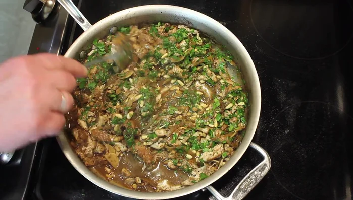 Taste and adjust seasoning with salt if needed. Serve with pita bread, a drizzle of tahini, and a squeeze of lemon (optional).