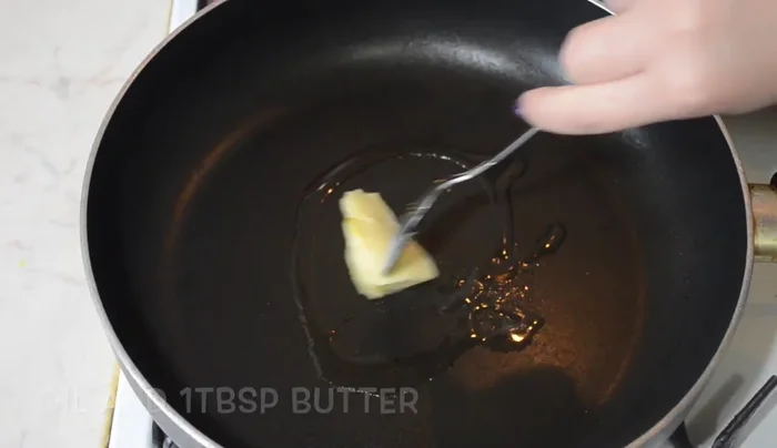 Fry meatballs in oil and butter until browned.