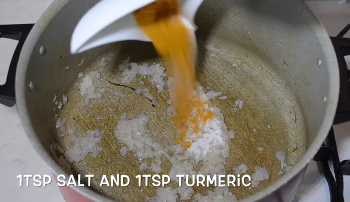 Add salt and turmeric, fry for another couple of minutes.