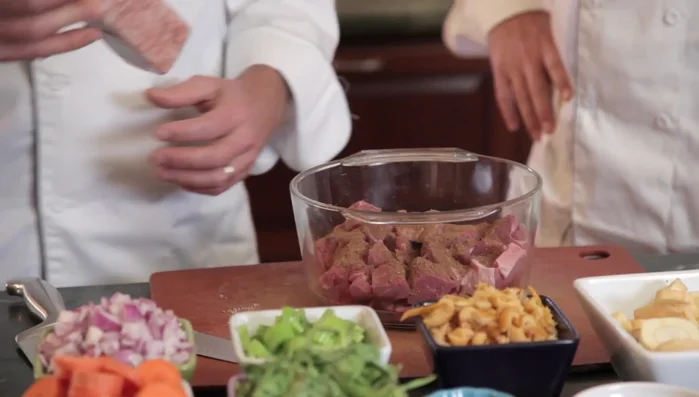 Season the lamb with the ground spices and salt.