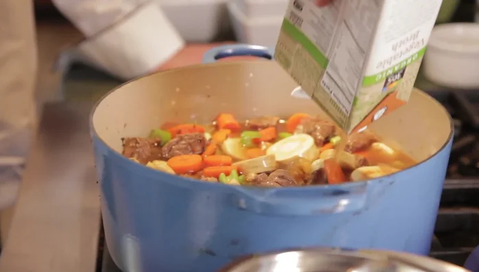 Add vegetable broth and lemon juice.