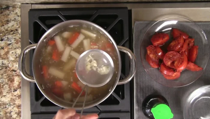 Add the tomato mixture and fish sauce. Cook for another 2 minutes.