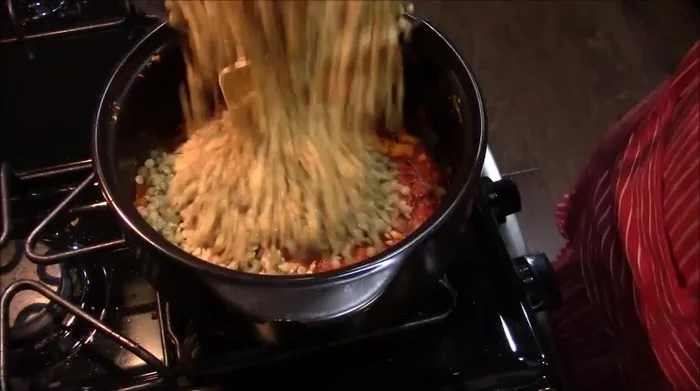 Drain the soaked lentils and add them to the pot along with the coconut milk and 2 cups of hot water.