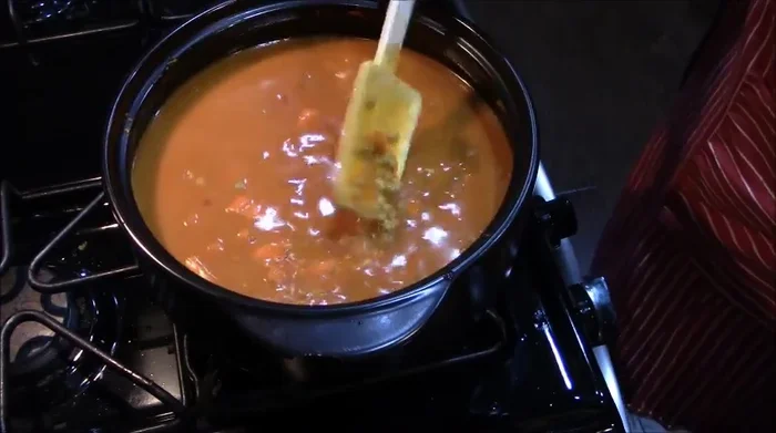 Bring the mixture to a boil, then reduce heat to a low simmer, cover, and cook for 15 minutes, or until lentils and sweet potatoes are tender.