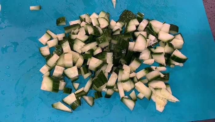 Chop the cucumber into smaller pieces.