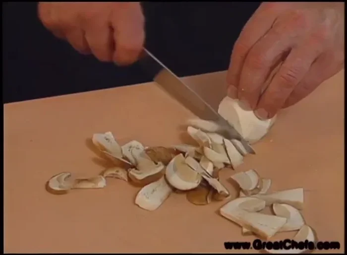 Slice the Sep or Pini mushrooms.