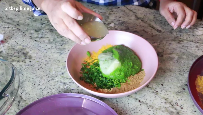 Add the onion-parsley paste and lime juice to the spice mixture. Mix well.