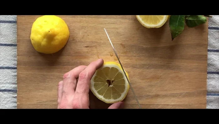 Cut the lemons (preferably Sicilian) into bite-sized pieces, removing the seeds. Cut away the yellow skin, leaving most of the white rind.