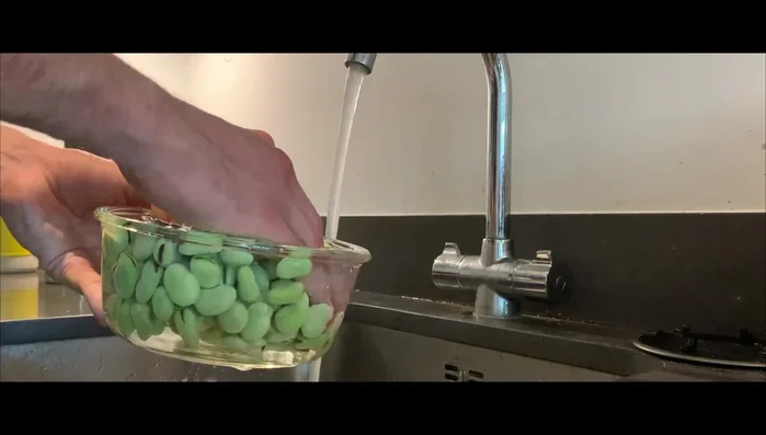 Wash the beans and place them on a baking sheet lined with parchment paper.