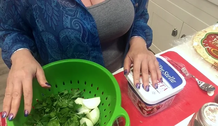 Chop parsley and onions. Crumble feta cheese. Grate mozzarella cheese.