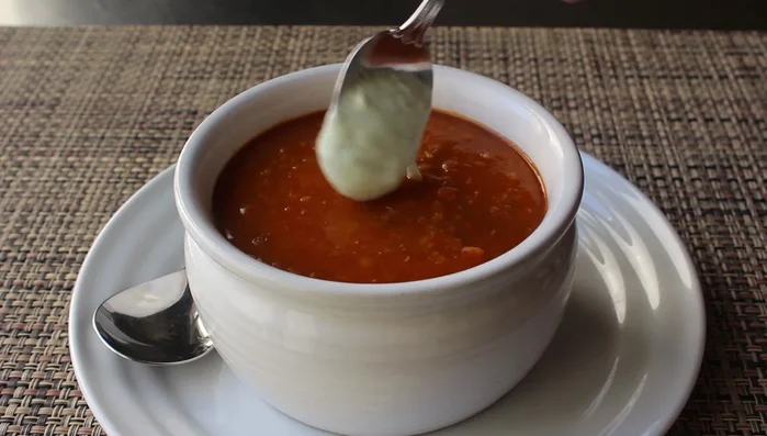 Ladle soup into bowls. Garnish with a swirl of lemon-mint yogurt and a pinch of finely sliced mint.