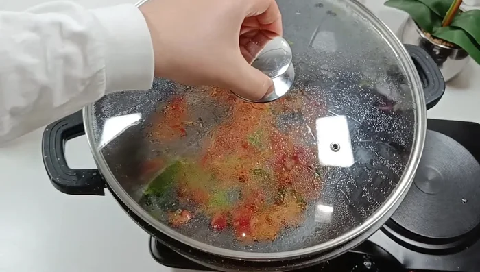 Cook the rice: Add washed rice to the pot with the sauce. Stir in mixed herbs (or substitutes). Fry for 2 minutes.