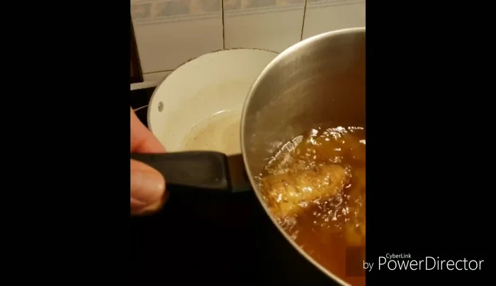 In the same pan, sauté chopped onions in some of the frying oil until softened.