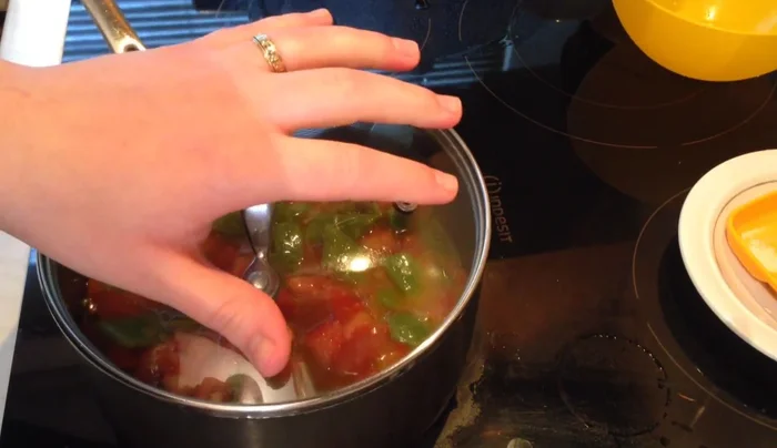 Cover and cook on medium heat for 10-15 minutes, checking for doneness. The beans should be slightly crunchy.