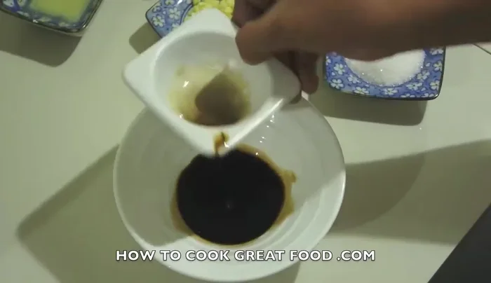 Prepare the marinade/gravy in a small bowl: Mix soy sauce, chopped chili, garlic, sugar, lemon juice, and fish sauce.