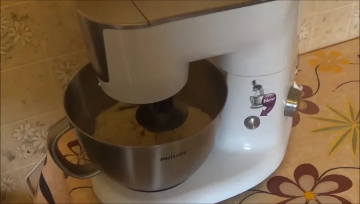 In a bowl, mix flour, salt, and diluted baker's yeast.