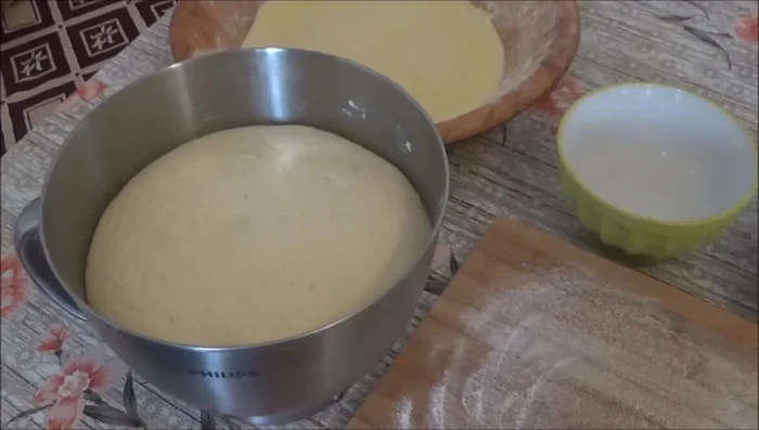 Divide the dough in half: one for m'srouk, one for pizza.