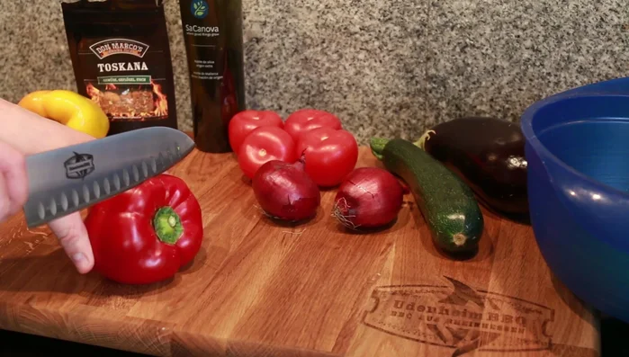 Prepare the peppers: Cut off the top and bottom, remove the seeds and membranes, then slice into 1-inch pieces. Add to the bowl.