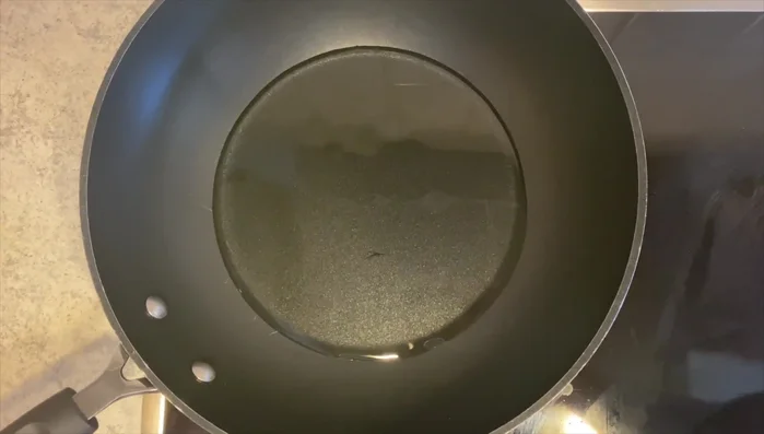Add the fish to the hot oil and fry on one side until golden brown (approximately 7 minutes).