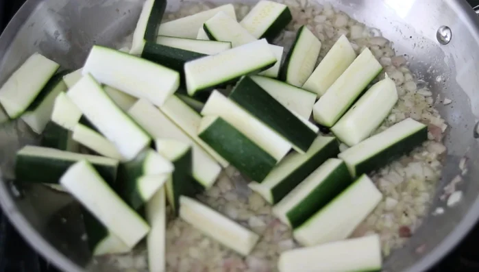 Add zucchini and stir. Continue stirring and cooking for 10-12 minutes, until slightly browned but not overcooked.