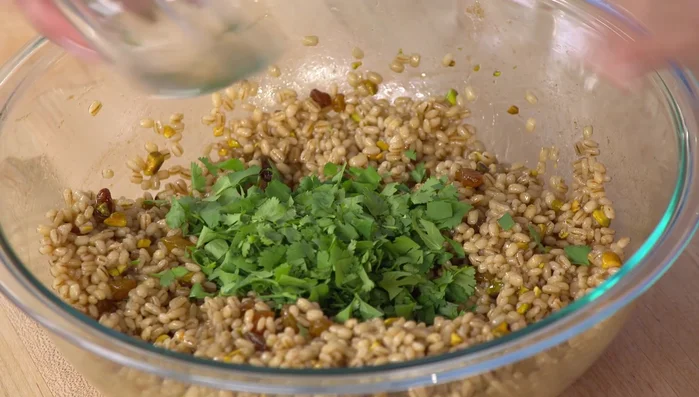 Add 1/2 cup of chopped fresh cilantro to the salad.