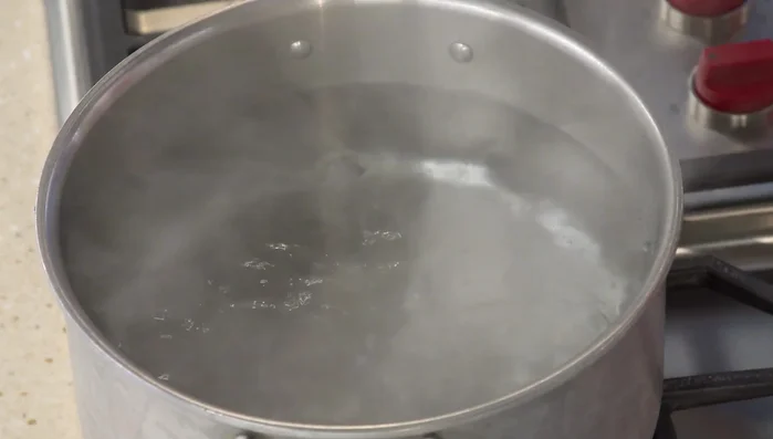 Boil 4 quarts of water in a pot. Add 1 tablespoon of salt.