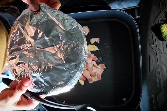 Cook bacon until crispy. Reserve bacon grease.