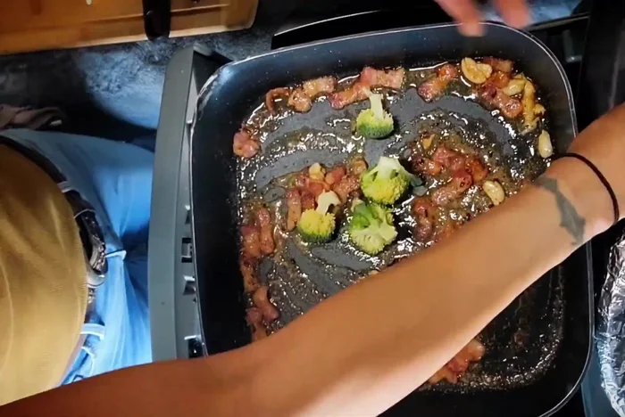 Add stir-fried vegetables to the pan and cook until tender.