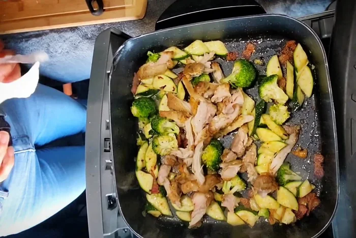Add cooked couscous, squash, and chicken to the pan. Stir to combine.