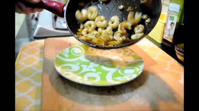 Transfer shrimp to a plate.