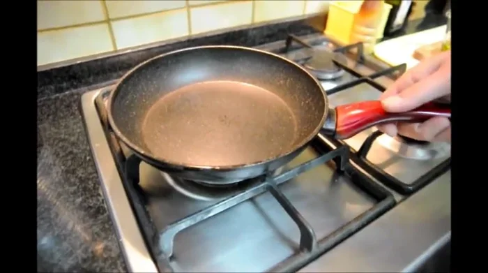 Preheat a pan over medium heat.