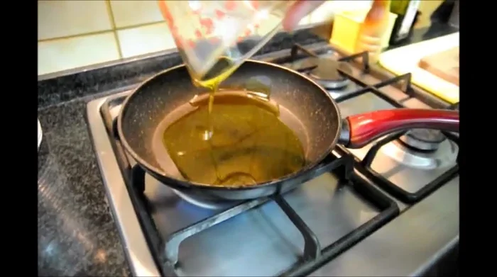 Add 1 1/3 cup of olive oil to the pan.
