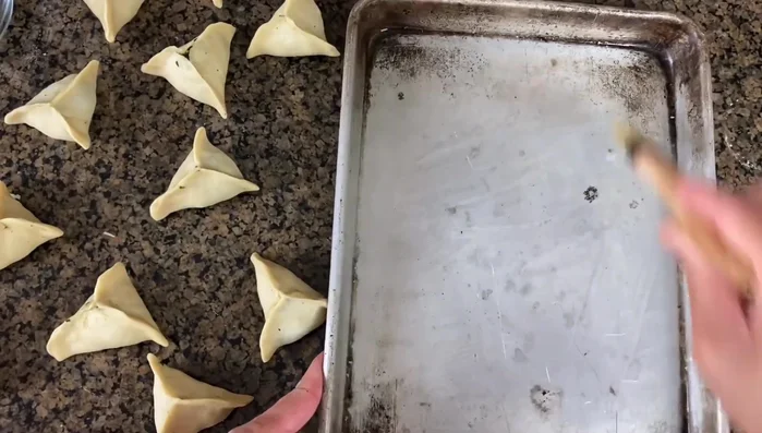 Bake at 375°F (or 350°F) for 20-25 minutes, or until golden brown. Brush with egg wash before baking for extra color and texture.